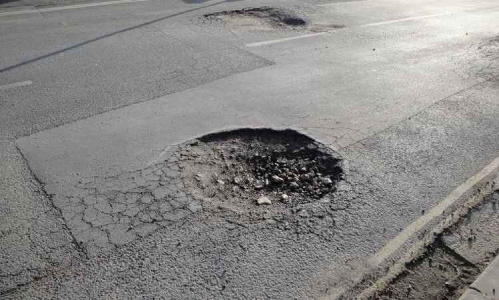 Road_Maintenance_Can_Minimize_the_Risk_of_Pothole_Damage.jpg
