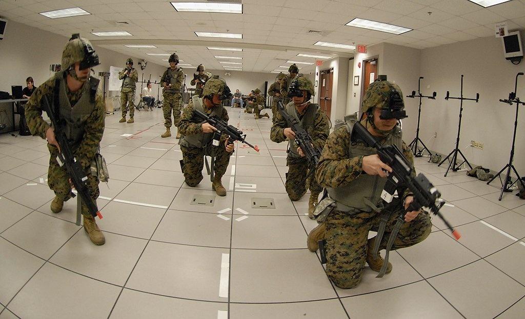 Photo of soldiers wearing VR equipment during a training excercise.